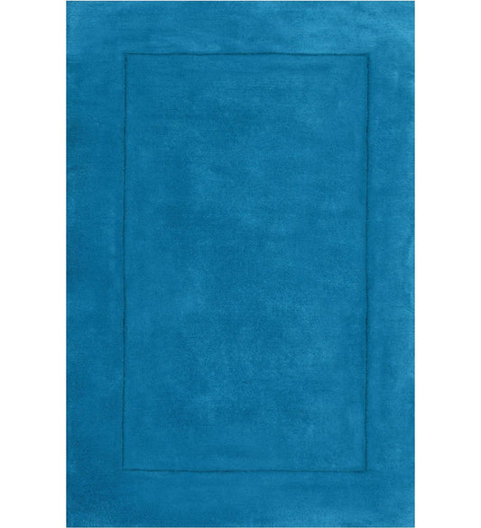 Solid teal hand-tufted wool rug with minimalist border design