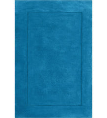Solid teal hand-tufted wool rug with minimalist border design