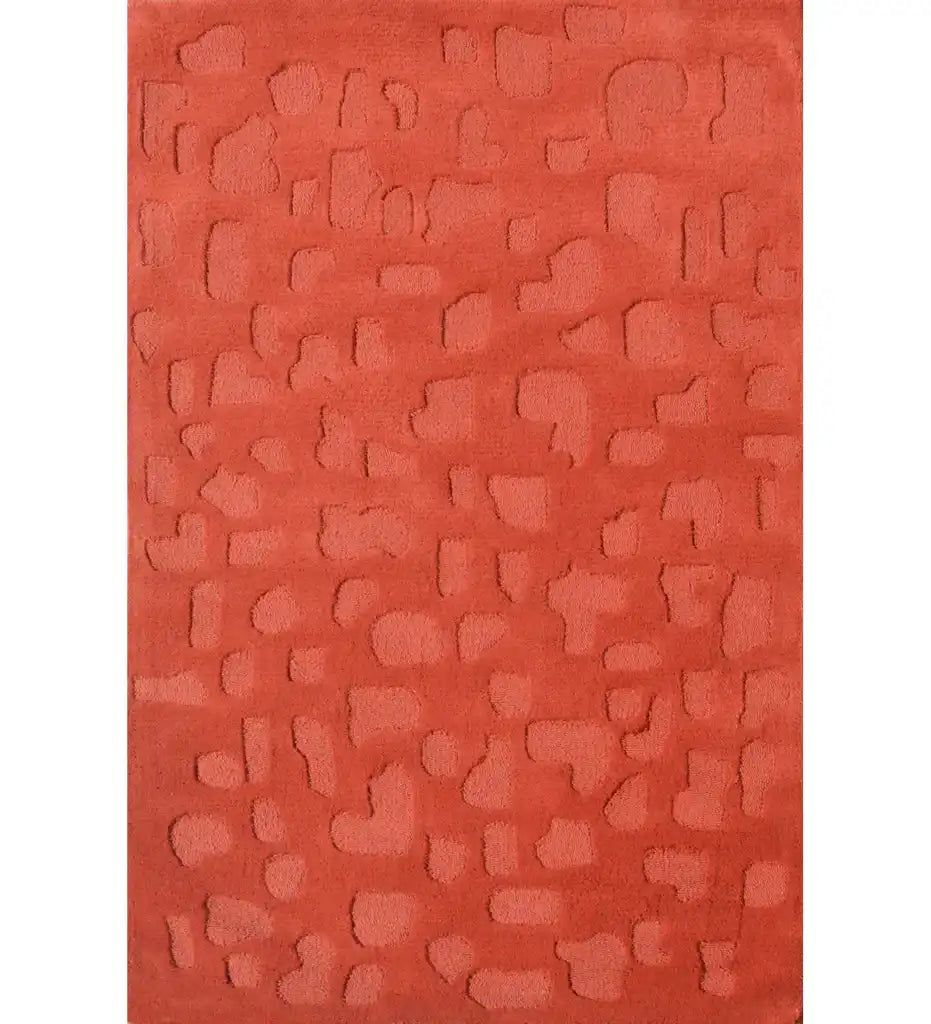 Terracotta orange embossed hand-tufted wool rug with abstract design