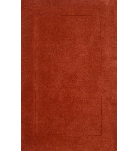 Solid terracotta orange hand-tufted wool rug with embossed rectangle