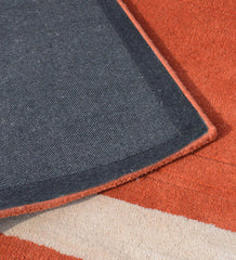 Contemporary terracotta rug with embossed rectangle detail