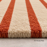 Terracotta and ivory 10x14 rectangular striped area rug for dining room with contemporary linear design