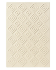 Textured cream hand-tufted wool rug with raised diamond carving.