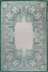 Tranquil Harmony hand-tufted rug with intricate green and blue floral border on light background