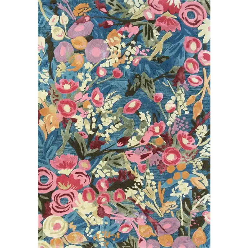 Luxury handwoven floral rug with pink, purple, orange, and cream flowers on blue background by Mannat Rugs