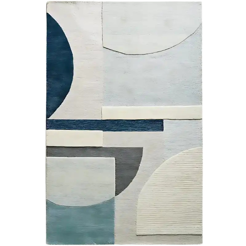Modern luxury rug with geometric shapes in blue, gray, and white hues, handwoven texture