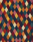 Contemporary geometric wool rug with bold diamond pattern.
