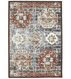 Vintage-style geometric patterned rug with octagonal medallions in rust, beige, and gray tones