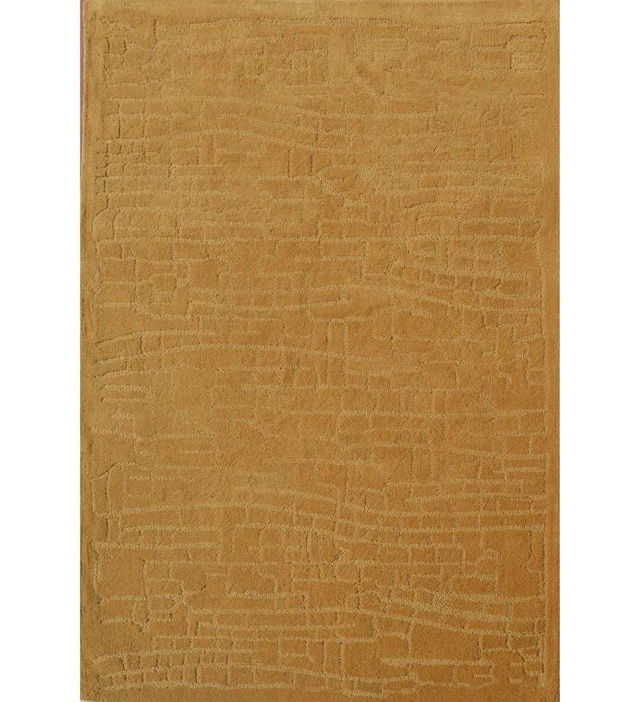 Golden mustard hand-tufted wool rug with subtle embossed pattern
