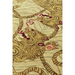 Close-up of luxury handwoven yellow tiger design rug with detailed stripes and pink accents