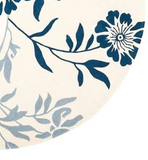 Round area rug featuring a floral vine pattern in navy blue indigo and light blue-gray on an off-white background.
