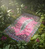 Decorative rug with a tiger design on a lush green background