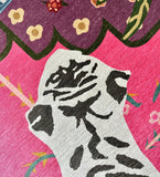 Artistic depiction of a pug dog with a colorful floral background