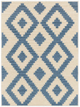A square area rug with a geometric diamond pattern in slate blue on a warm cream background.