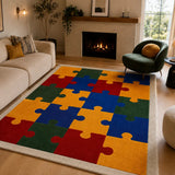 A large rectangular area rug with a colorful jigsaw puzzle pattern in red, yellow, blue, and green, styled in a modern living room next to a beige sofa and a fireplace.