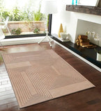 Beige modern geometric pattern rug on hardwood floor in contemporary living room