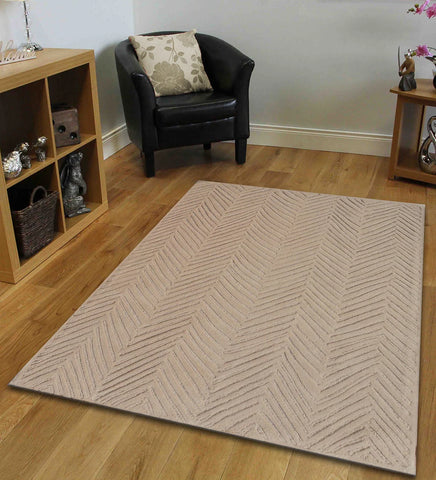 Neutral modern chevron area rug for living room decor.