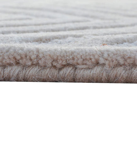 Contemporary neutral tone chevron rug for bedroom.
