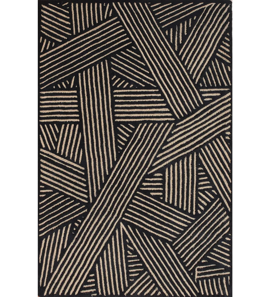 Beige and black hand-tufted wool rug with modern abstract line pattern.