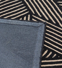 Designer hand-tufted area rug with abstract beige line detailing.