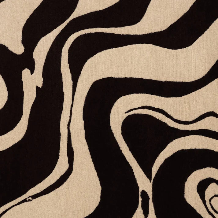 Beige and black modern area rug made with 100% natural New Zealand wool.