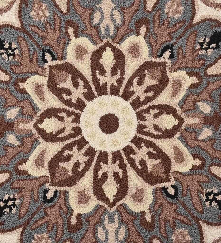 Classic beige and brown wool rug with blue border details