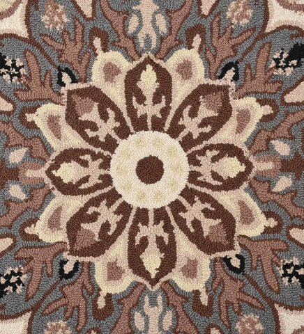 Classic beige and brown wool rug with blue border details