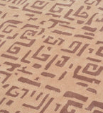 Beige and brown modern tribal rug with geometric abstract pattern