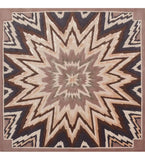 Beige and brown starburst geometric rug with sharp zigzag pattern and earthy tones