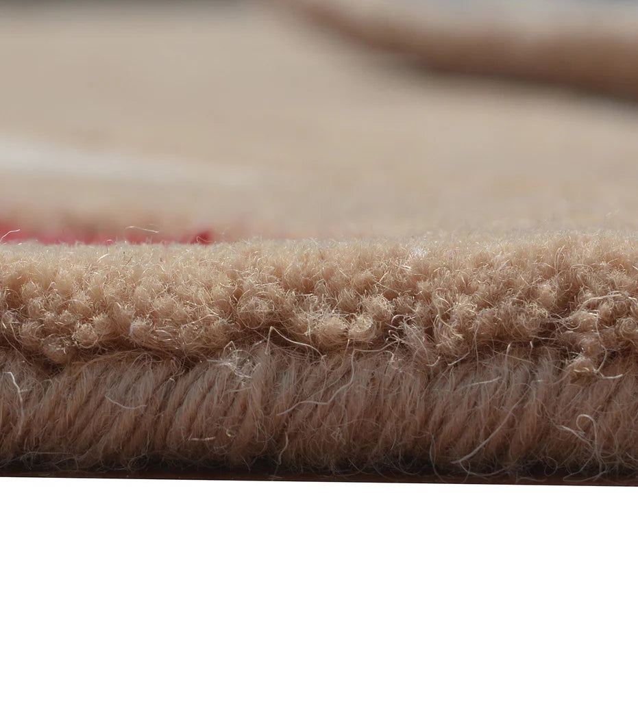 Contemporary floral-inspired wool rug in beige and red