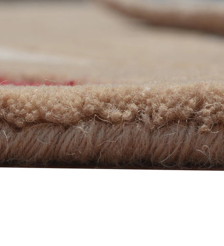 Contemporary floral-inspired wool rug in beige and red