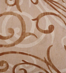 Soft beige and tan floor rug for living room or bedroom.