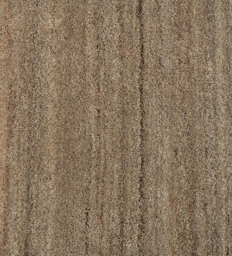 Hand-tufted wool rug with subtle horizontal pattern
