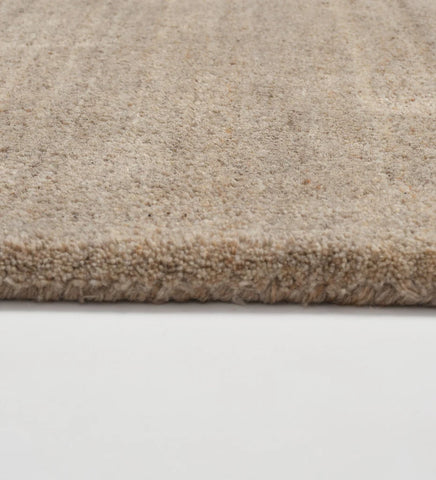 Premium taupe wool rug with linear detailing