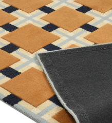 Luxury wool rug featuring terracotta and navy geometric design