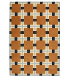 Hand-tufted wool rug with terracotta squares and navy grid design