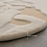 Beige and ivory wool rug