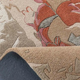 Close-up of beige and blush floral abstract rug with textured handwoven design and vibrant patterns