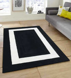 Black and white handwoven wool rug with solid geometric design in modern living room