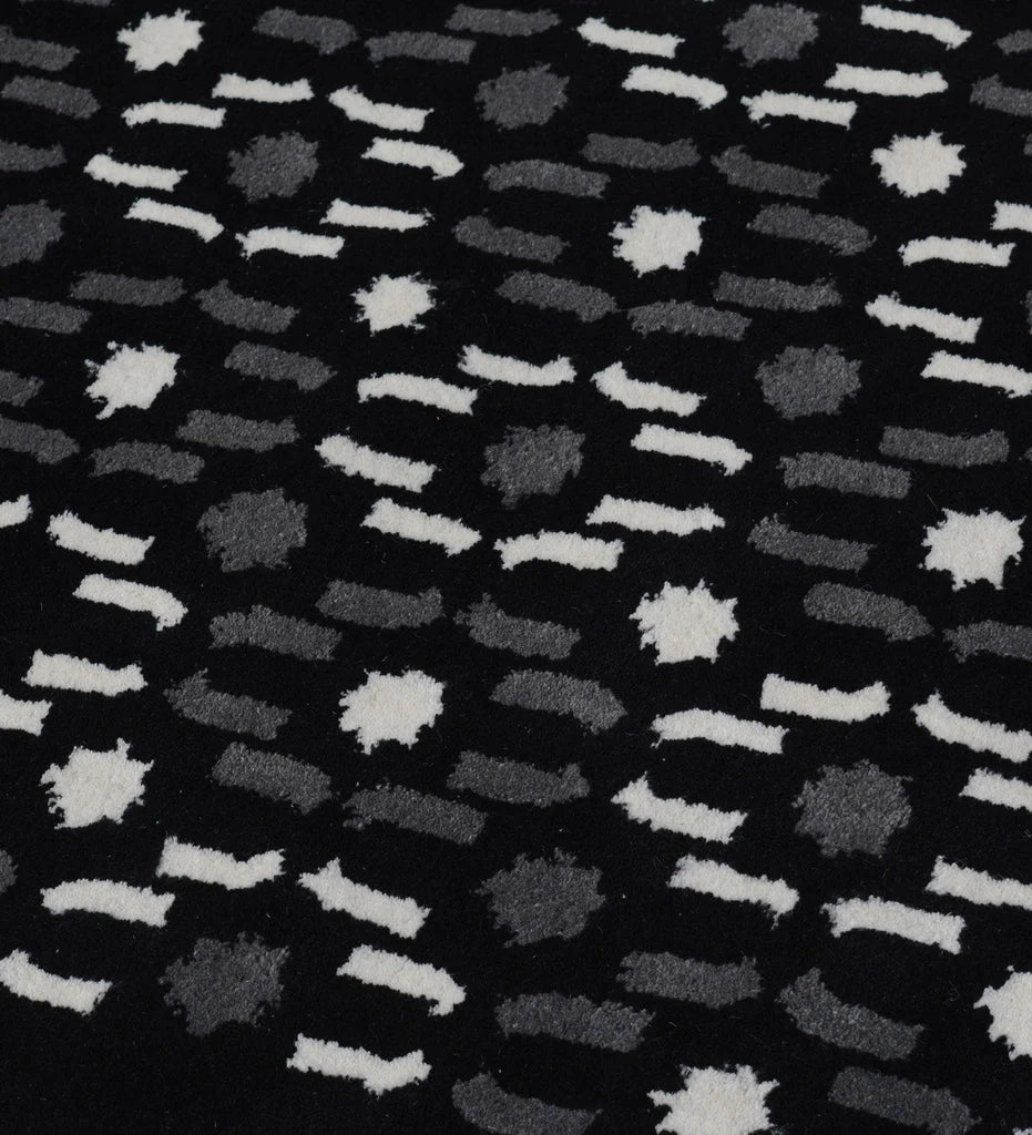Luxury black rug featuring abstract grey and white details