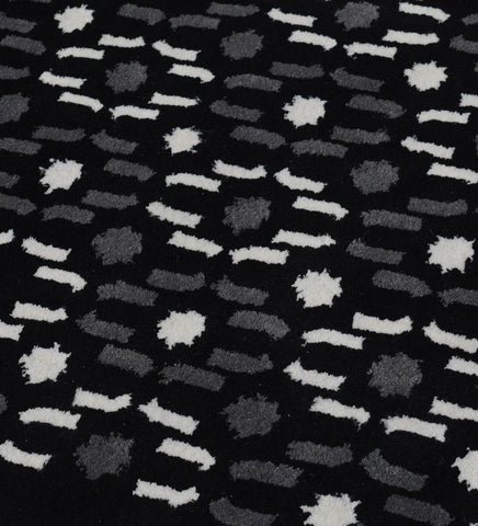 Luxury black rug featuring abstract grey and white details