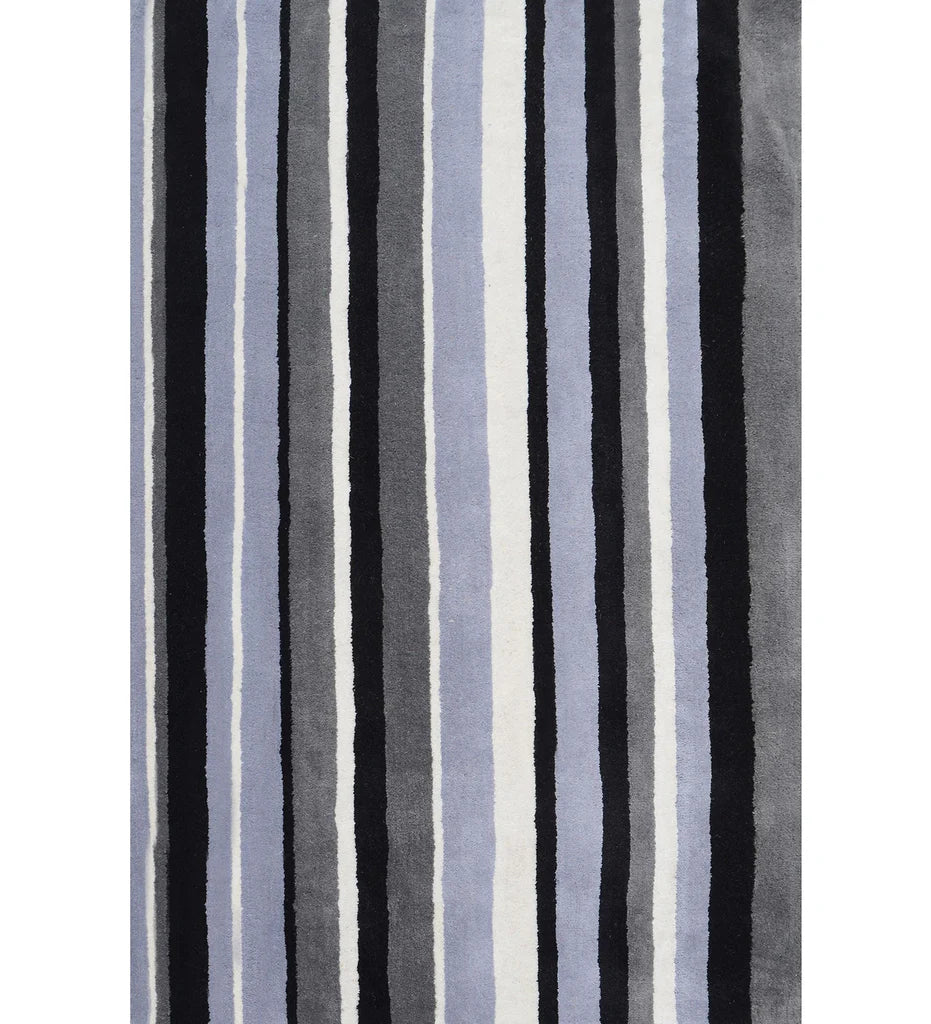 Black, gray, and blue hand-tufted wool rug with vertical striped pattern.