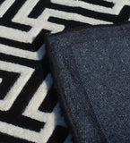 Contemporary black and white rug with bold maze pattern