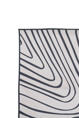 Stylish black and white geometric abstract area rug.