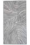 Modern abstract black and white luxury rug with wavy line pattern