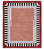 Rug with a striped border on a red background