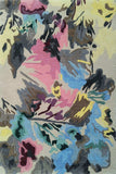 Colorful Bloomburst hand-tufted wool rug with abstract floral design in pink, blue, yellow, and green