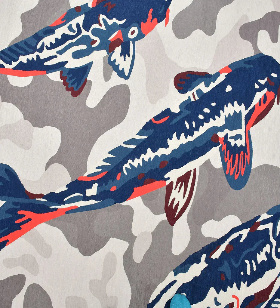 Soft nautical rug in shades of blue.
