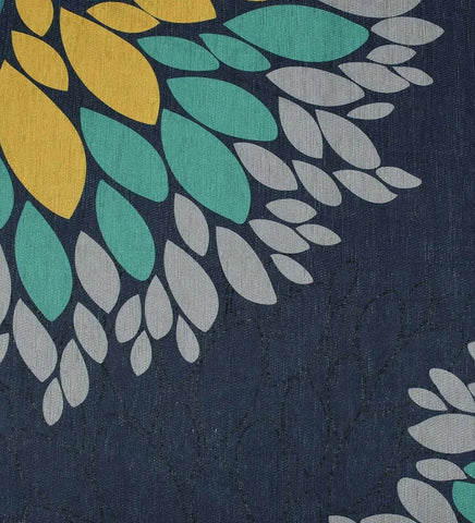 Modern floral design rug in blue and ivory.