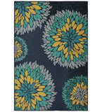 Blue modern floral rug with teal, yellow, and gray petals on dark background, luxury handwoven design